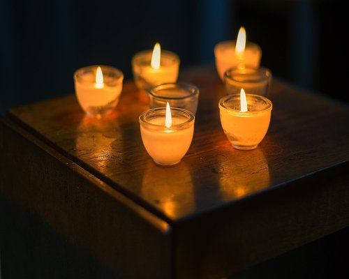 A quiet bedroom setting with dim lights
